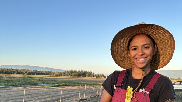Owner holding produce